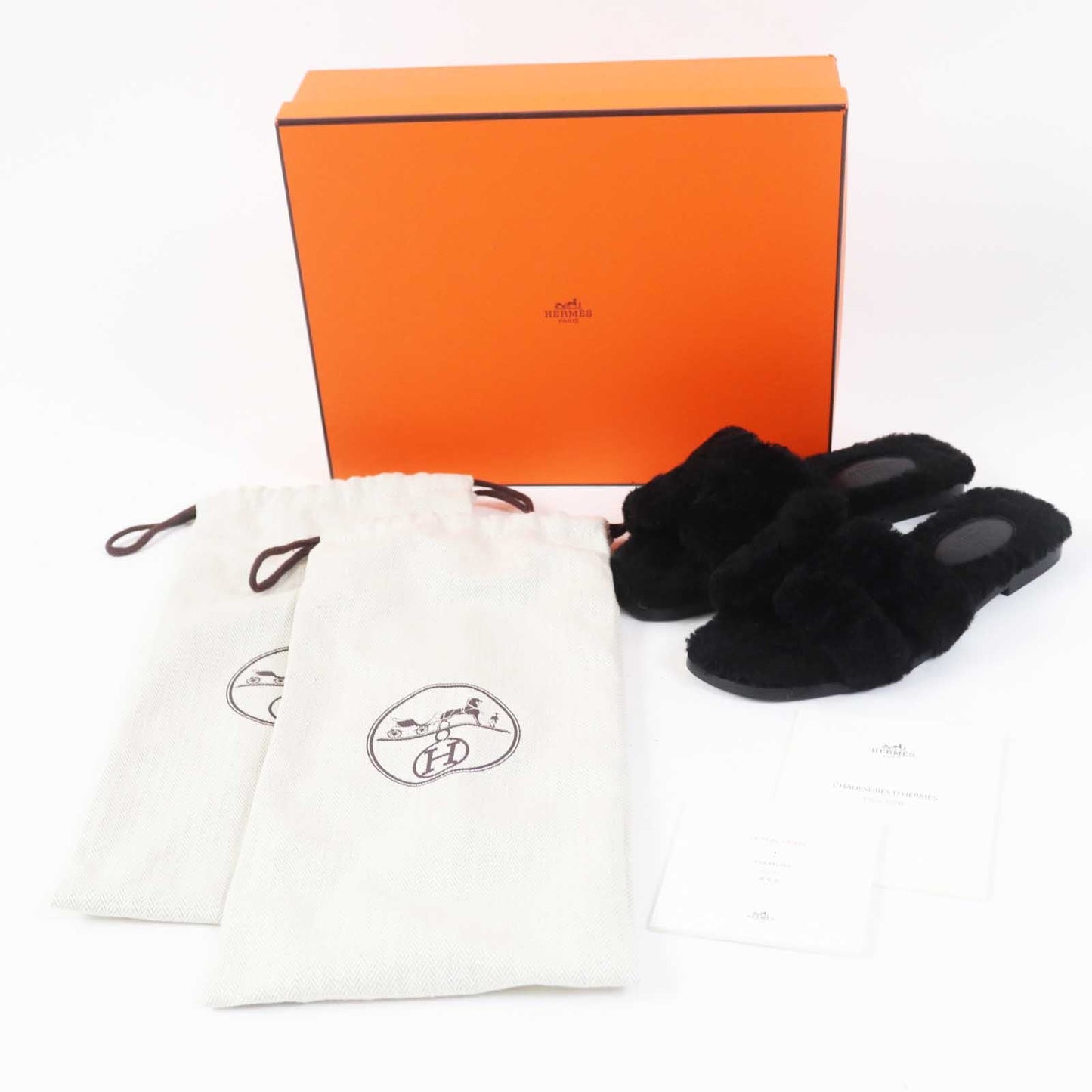 Hermès Oran Sandals in Black Mouton Shearling – Size 35,