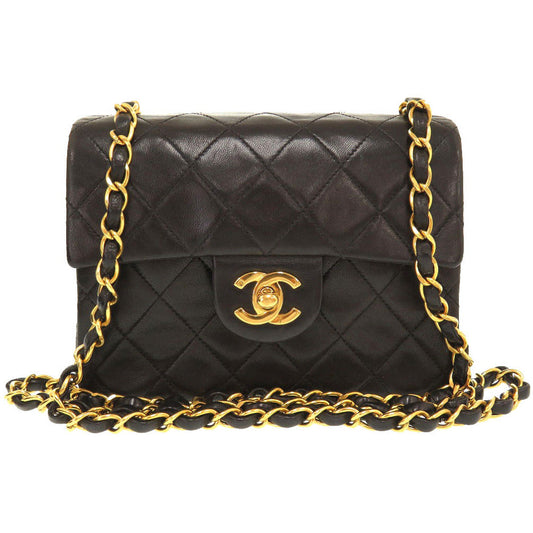CHANEL Mini Matelassée Black Lambskin
Gold-Tone Hardware CC logo