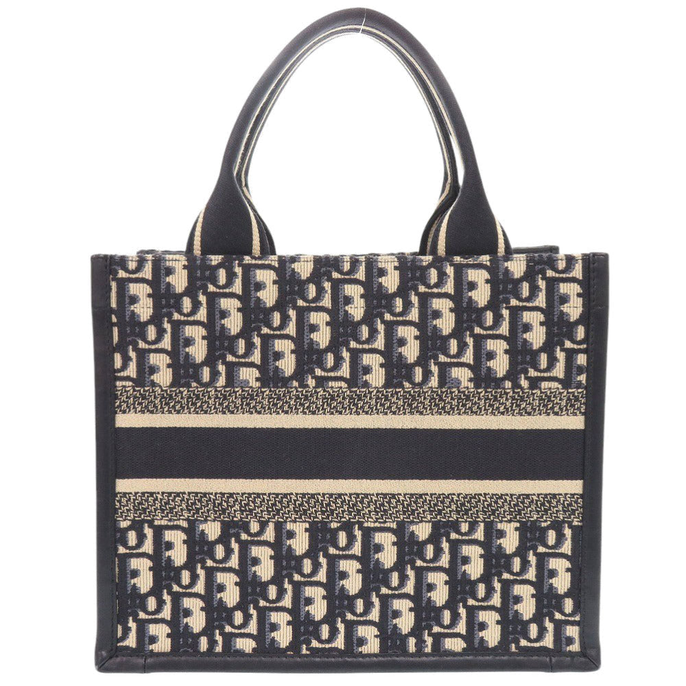 Christian Dior Oblique Book Tote                  Canvas & Leather                                            100% Authentic                                                     ✨ Excellent Pre-Owned Condition                       ~ 31% off MSRP