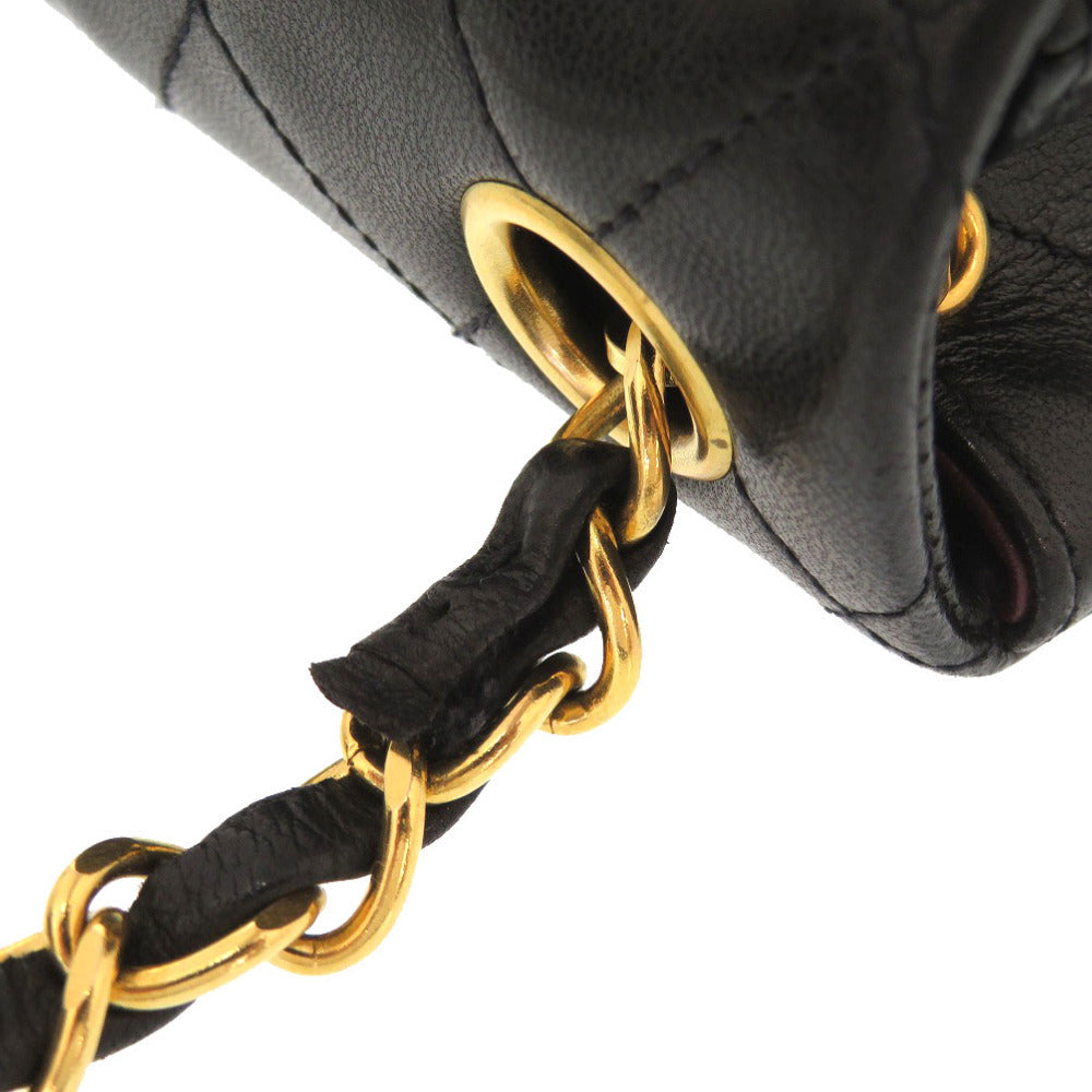 CHANEL Mini Matelassée Black Lambskin
Gold-Tone Hardware CC logo