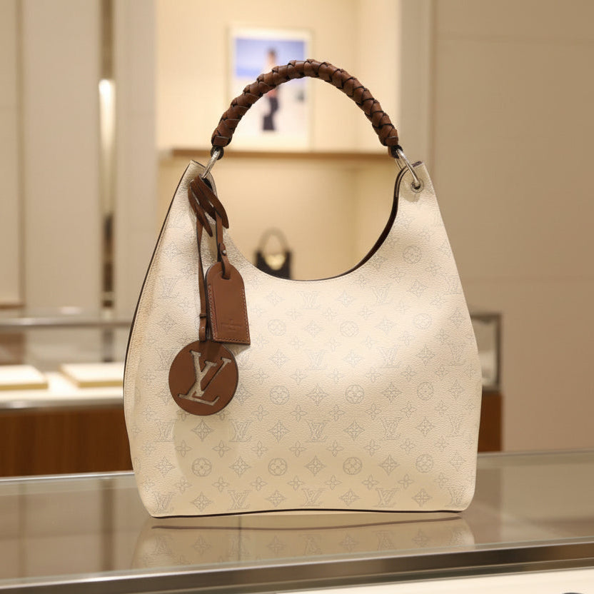 Louis Vuitton Carmel Hobo Mahina Leather Creme Off-White Shoulder Bag Pre-Owned  – Pristine Condition | L’LUXE Authentic’s