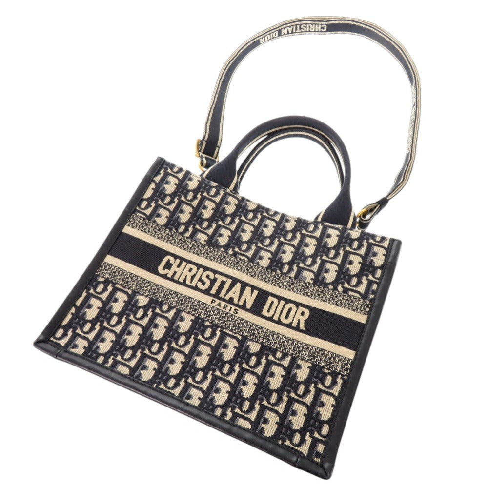 Christian Dior Oblique Book Tote                  Canvas & Leather                                            100% Authentic                                                     ✨ Excellent Pre-Owned Condition                       ~ 31% off MSRP