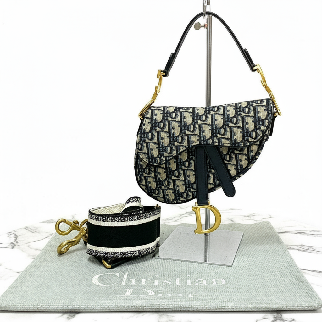 Christian Dior Oblique Saddle Bag (Reissue)
Leather, Canvas Navy Trotter Patern Oblique by John Galliano Revival Design 100% Authentic ✨Pre-Owned Near Mint Condition~ 31% off MSRP