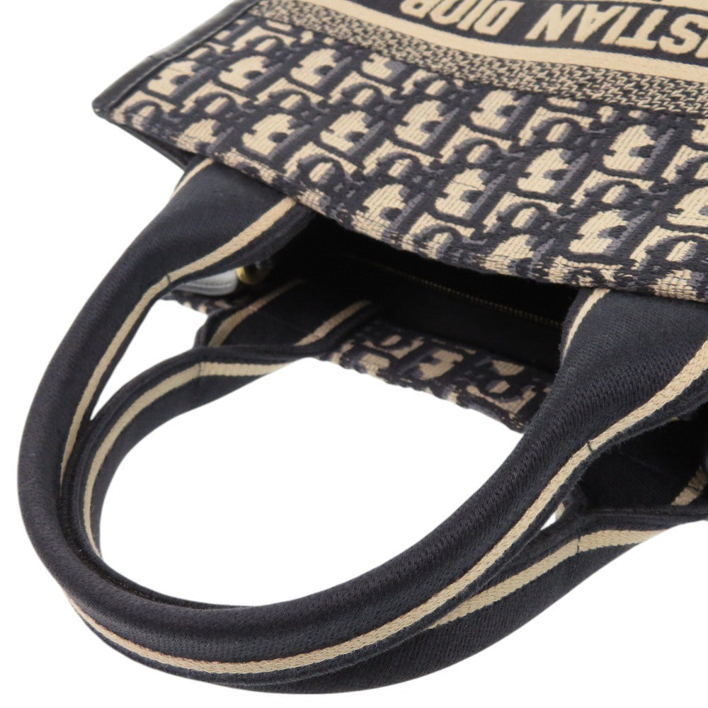 Christian Dior Oblique Book Tote                  Canvas & Leather                                            100% Authentic                                                     ✨ Excellent Pre-Owned Condition                       ~ 31% off MSRP