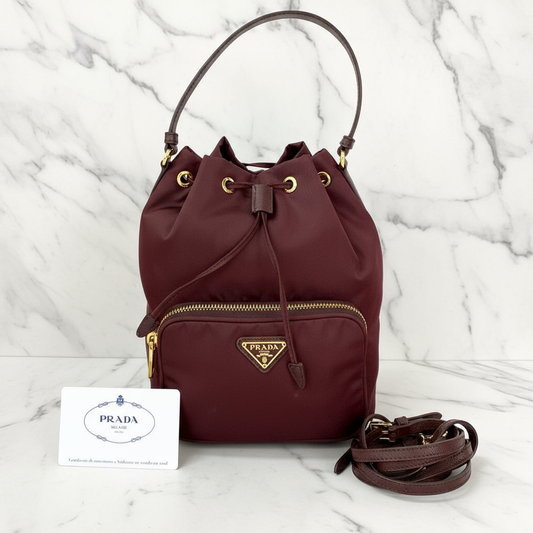 Prada                                                                 Duet in Wine Red                                             100% Authentic                                                    ✨Very Good Pre-Owned Condition               -27% off MSRP