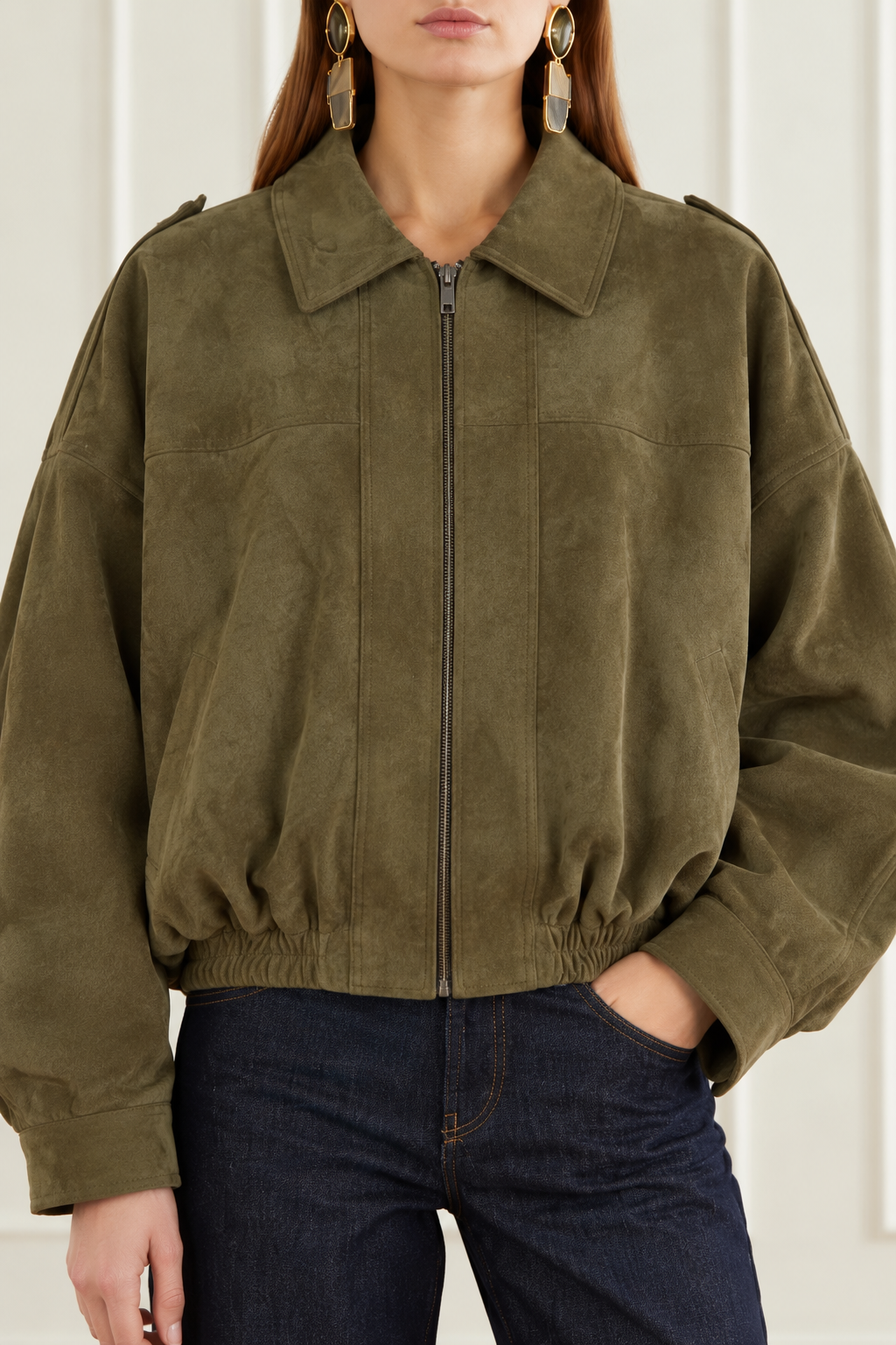 Relaxed khaki bomber jacket with a soft suede-effect finish, oversized dropped shoulders and contemporary cropped silhouette.