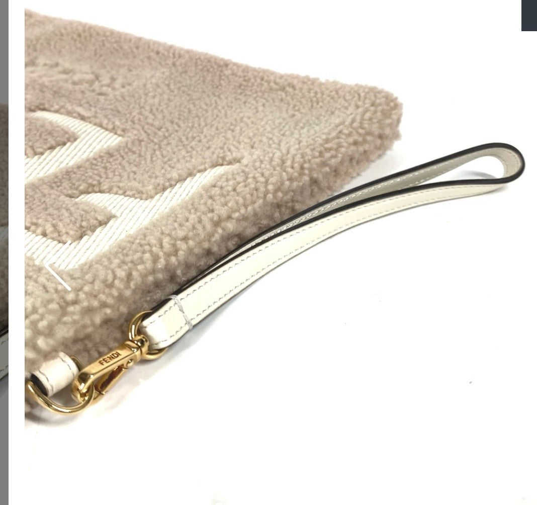 Fendi Mouton Logo Boa Clutch Pouch Beige Shearling – Previously Owned Authentic