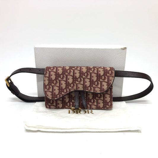 Christian Dior     Bordeaux Trotter Monogram Canvas with Leather Accents Saddle Belt Pouch