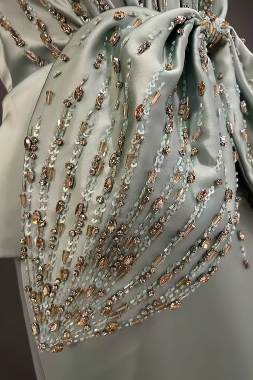 A Pale Mint Green Halter Evening Gown with Crystal-Style Waist Detail Formal Dress