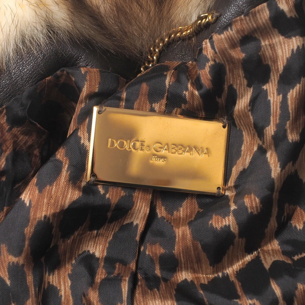 Dolce & Gabbana hooded jacket of brown leather and polecat fur, with goldtone logo buckle closures Size 38 – 100% Authentic ✨Pre-Owned A Condition ~28% Off MSRP
