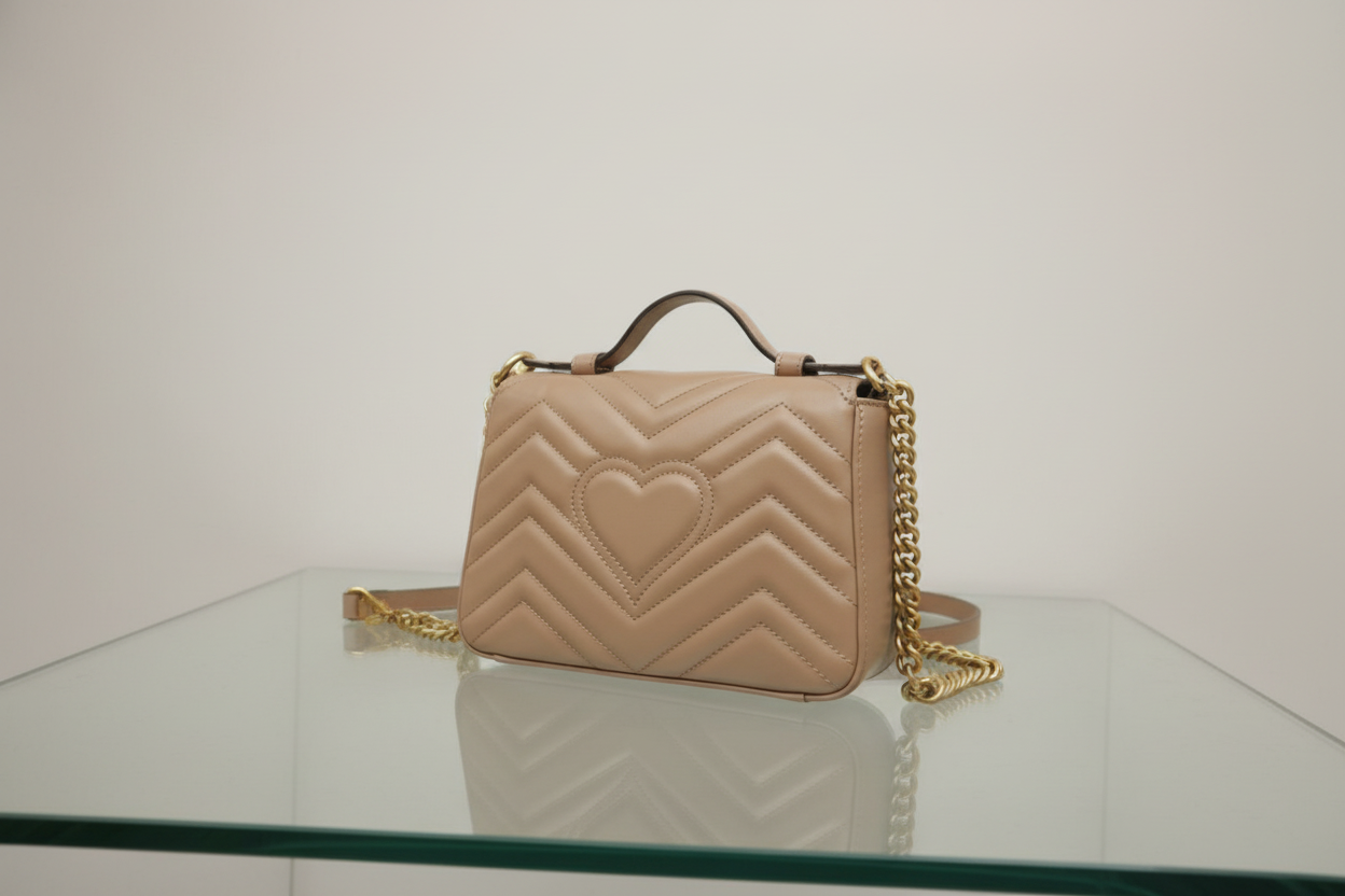 Gucci GG Marmont Mini Top Handle Bag Dusty Pink Leather Antique Gold Hardware Previously Owned Authentic