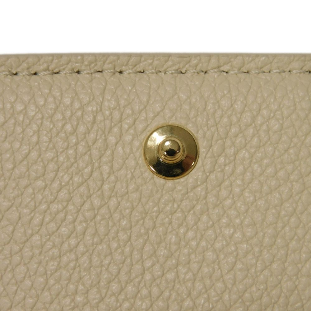 LOUIS VUITTON – Portefeuille Claire Bifold – Monogram Empreinte Leather – Rose Trianon Bicolor