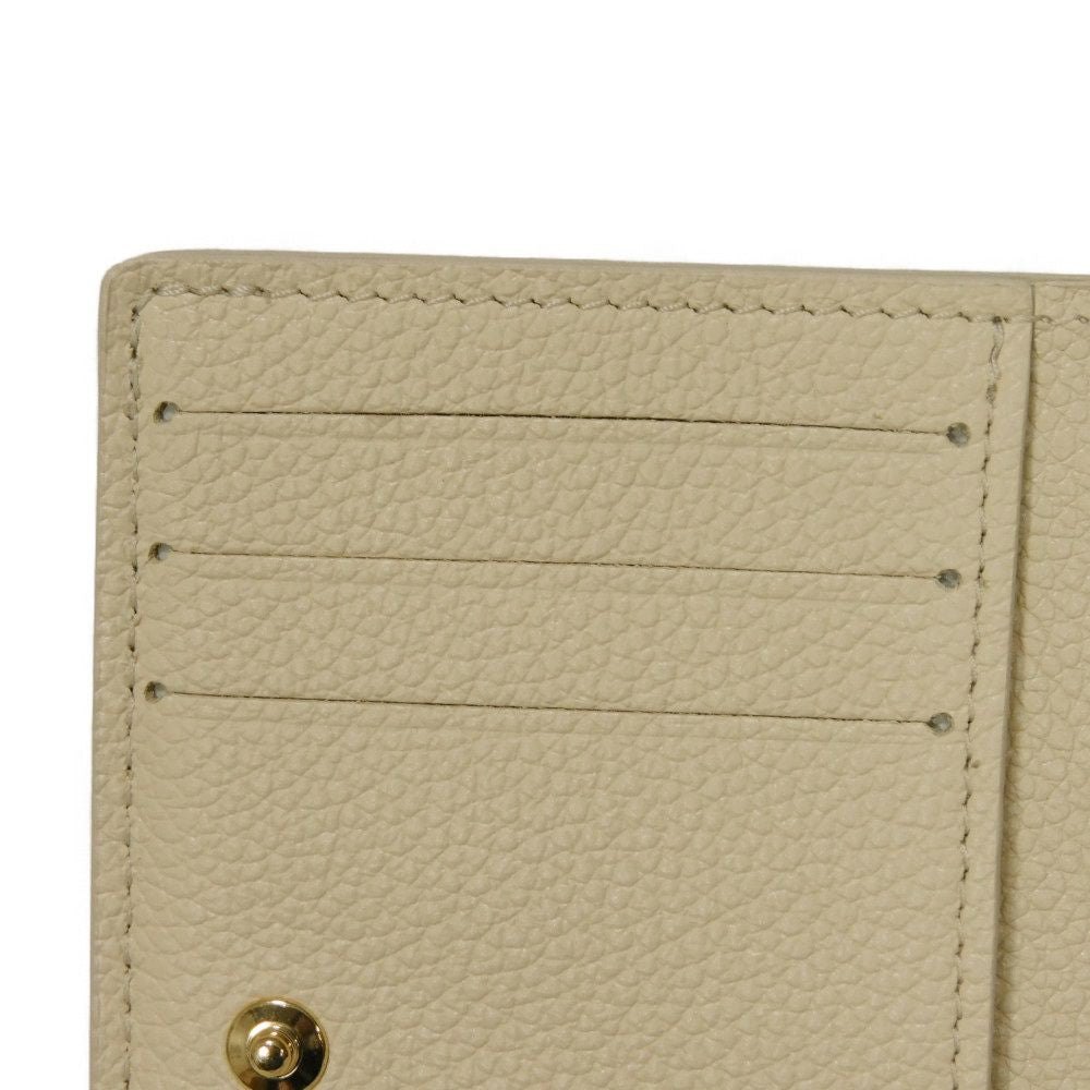 LOUIS VUITTON – Portefeuille Claire Bifold – Monogram Empreinte Leather – Rose Trianon Bicolor