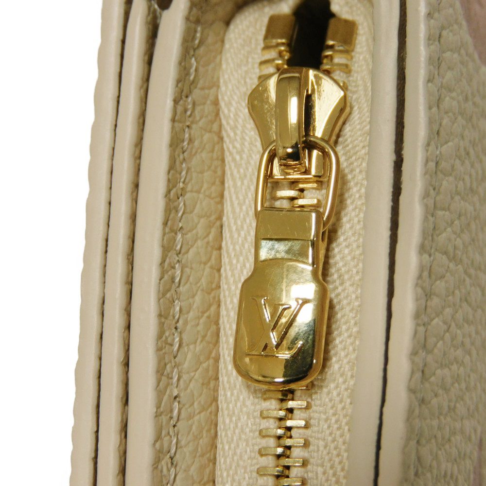 LOUIS VUITTON – Portefeuille Claire Bifold – Monogram Empreinte Leather – Rose Trianon Bicolor