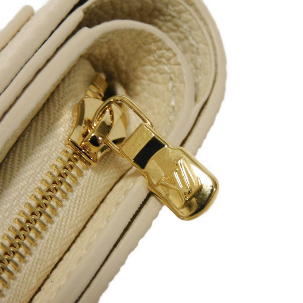 LOUIS VUITTON – Portefeuille Claire Bifold – Monogram Empreinte Leather – Rose Trianon Bicolor