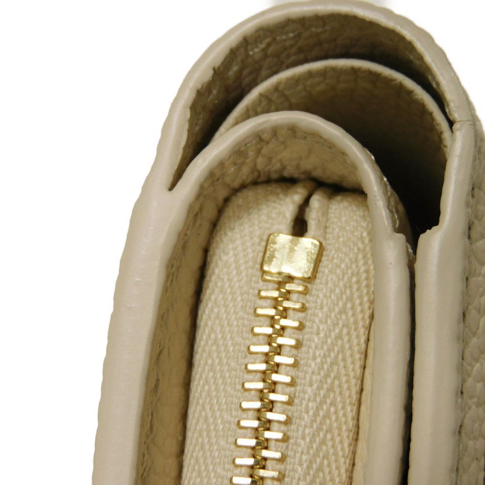 LOUIS VUITTON – Portefeuille Claire Bifold – Monogram Empreinte Leather – Rose Trianon Bicolor