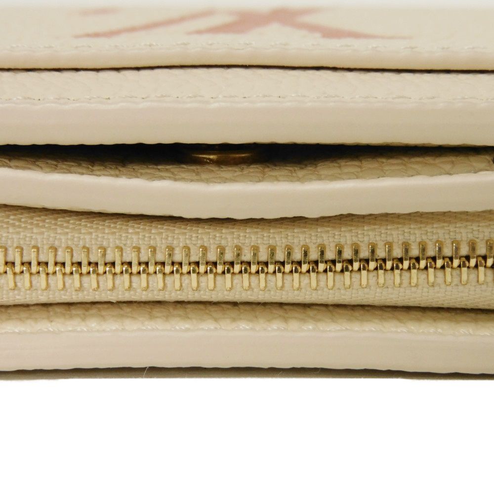 LOUIS VUITTON – Portefeuille Claire Bifold – Monogram Empreinte Leather – Rose Trianon Bicolor