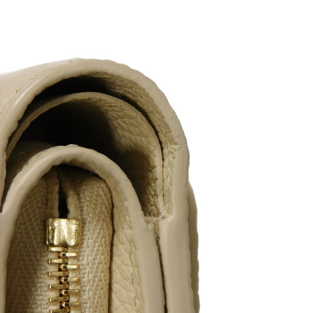 LOUIS VUITTON – Portefeuille Claire Bifold – Monogram Empreinte Leather – Rose Trianon Bicolor