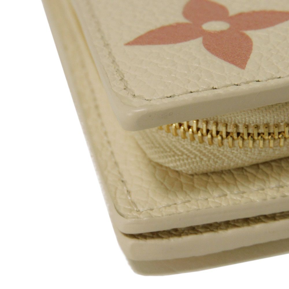 LOUIS VUITTON – Portefeuille Claire Bifold – Monogram Empreinte Leather – Rose Trianon Bicolor