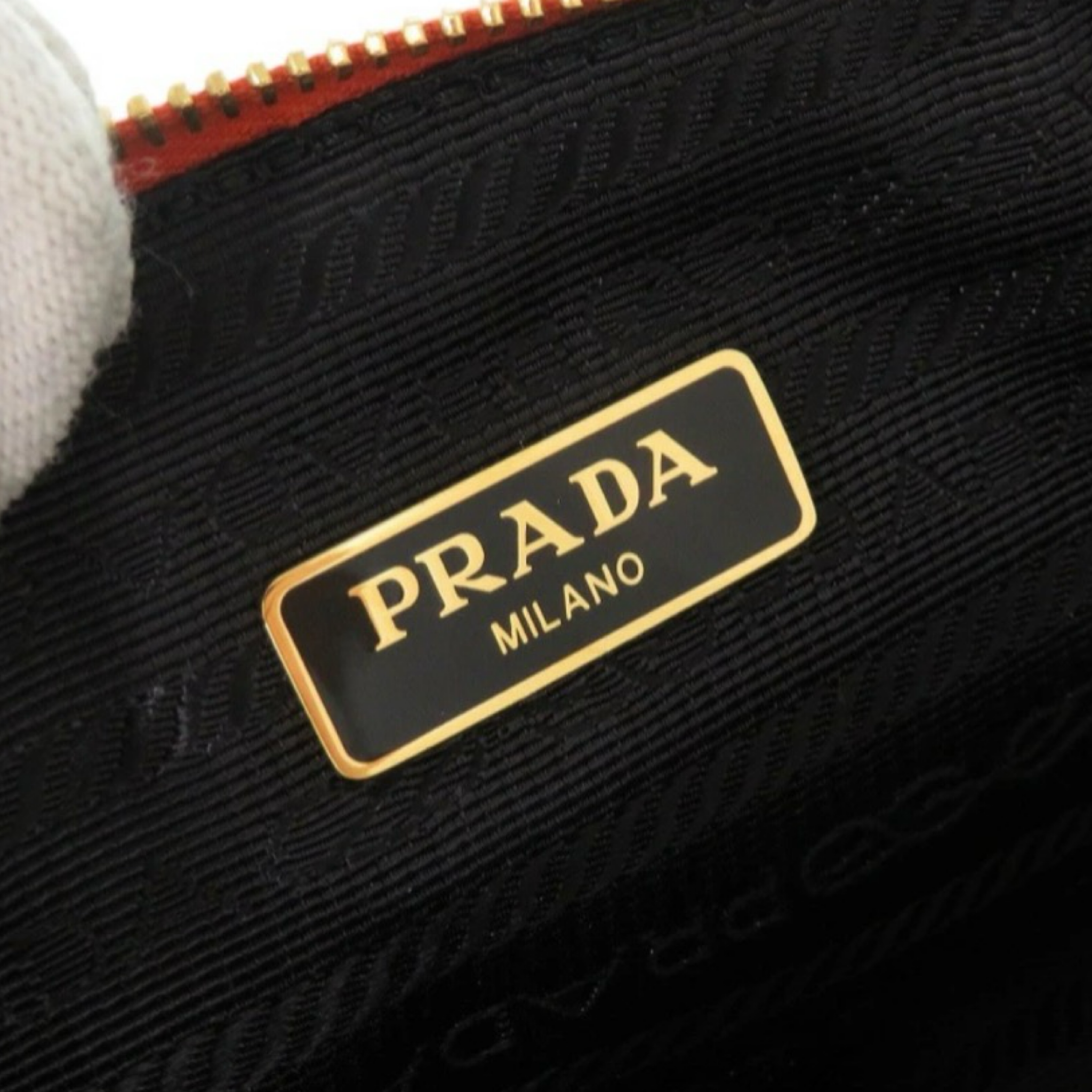 Prada Orange Leather Cosmetic Pouch Gold Hardware Previously Owned Authentic