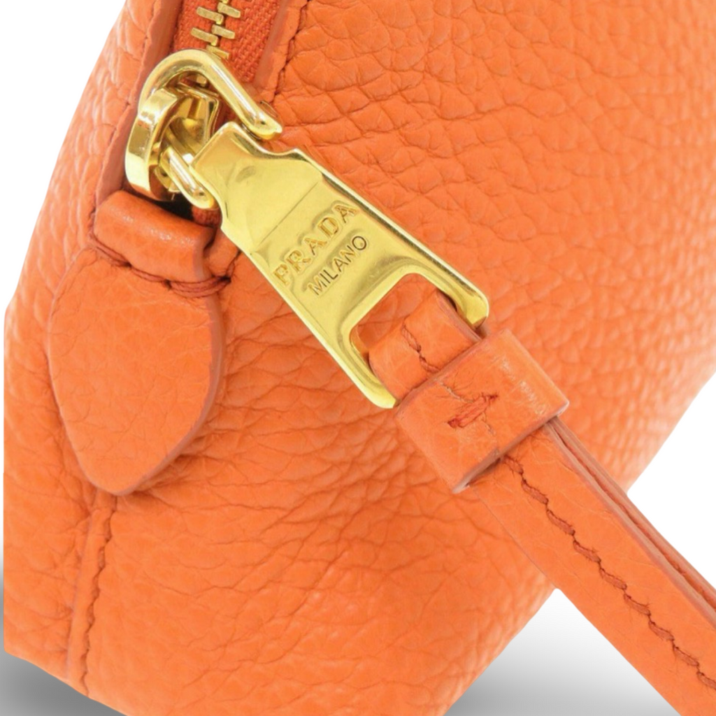 Prada Orange Leather Cosmetic Pouch Gold Hardware Previously Owned Authentic