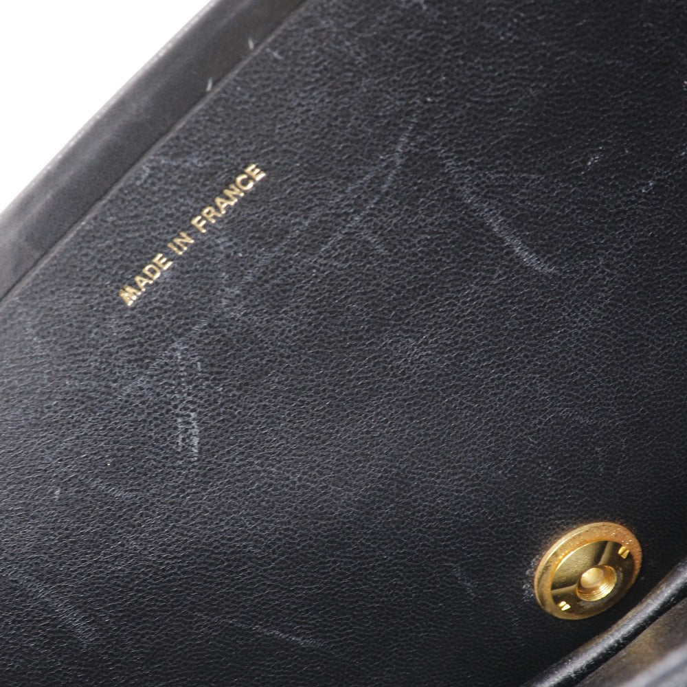 CHANEL vintage Chain Shoulder bag in black calfskin with classic COCO Mark harware ✨Previously Owned Vintage Condition