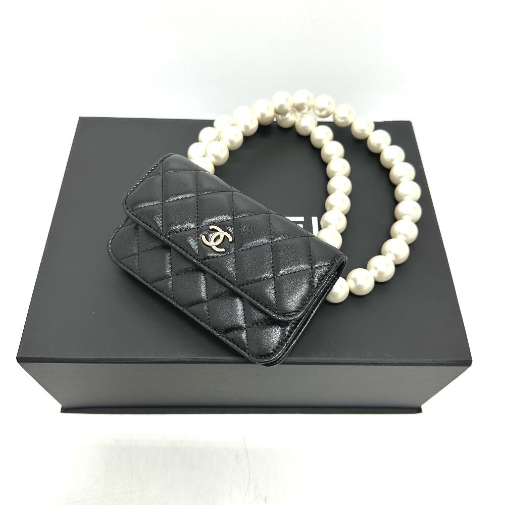 CHANEL Pearl Shoulder Mini Bag in Black Lambskin – CC COCO Mark, Item No. G - 231225 - 109 Designed by Karl Lagerfeld, Early 2010s, 100% Authentic Pre - Owned Like new / excellent condition - LLUXE.CA