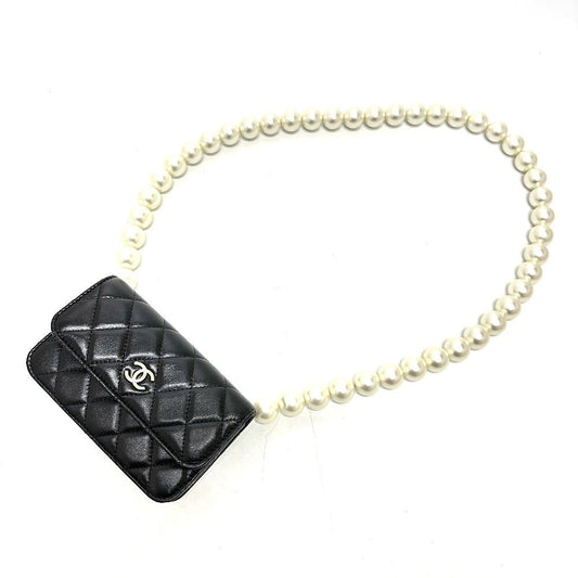 CHANEL Pearl Shoulder Mini Bag in Black Lambskin – CC COCO Mark, Item No. G - 231225 - 109 Designed by Karl Lagerfeld, Early 2010s, 100% Authentic Pre - Owned Like new / excellent condition - LLUXE.CA