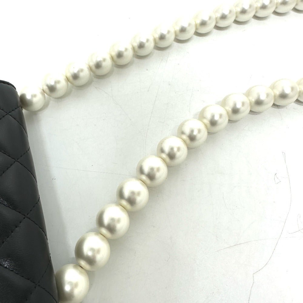CHANEL Pearl Shoulder Mini Bag in Black Lambskin – CC COCO Mark, Item No. G - 231225 - 109 Designed by Karl Lagerfeld, Early 2010s, 100% Authentic Pre - Owned Like new / excellent condition - LLUXE.CA