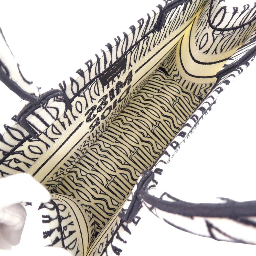 CHRISTIAN DIOR – Medium Book Tote – Embroidered Canvas – Maria Grazia Chiuri – 2021 – 100% Authentic Pre - Owned Item No.: 6L1743ILI6R4 - LLUXE.CA