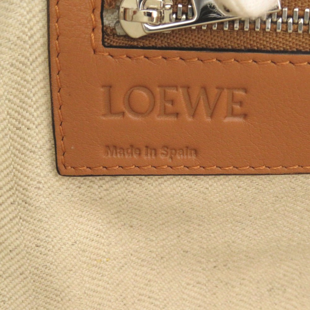 LOEWE – T Pouch Clutch – Item No. 6L1522EBP5R4 – Jonathan Anderson – Circa 2015–2016 – 100% Authentic Pre - Owned - LLUXE.CA