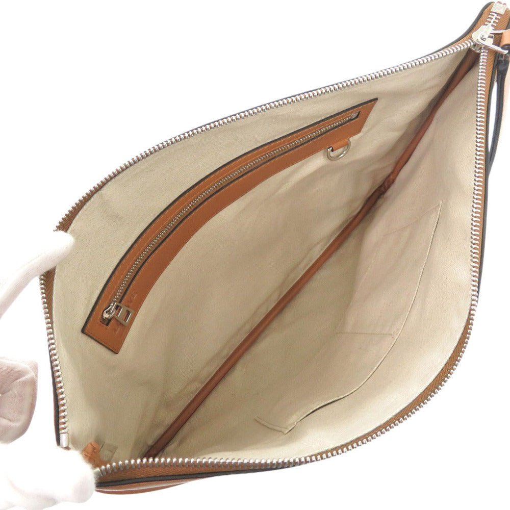 LOEWE – T Pouch Clutch – Item No. 6L1522EBP5R4 – Jonathan Anderson – Circa 2015–2016 – 100% Authentic Pre - Owned - LLUXE.CA