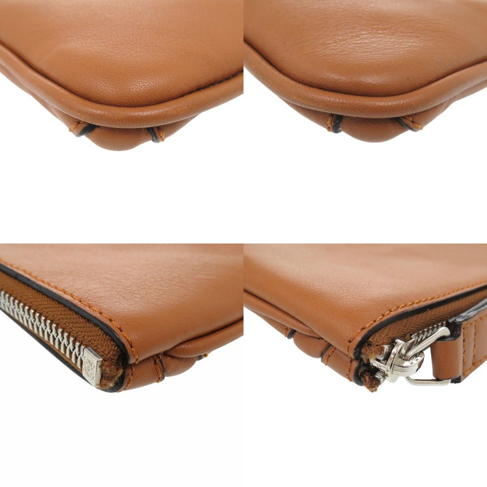 LOEWE – T Pouch Clutch – Item No. 6L1522EBP5R4 – Jonathan Anderson – Circa 2015–2016 – 100% Authentic Pre - Owned - LLUXE.CA