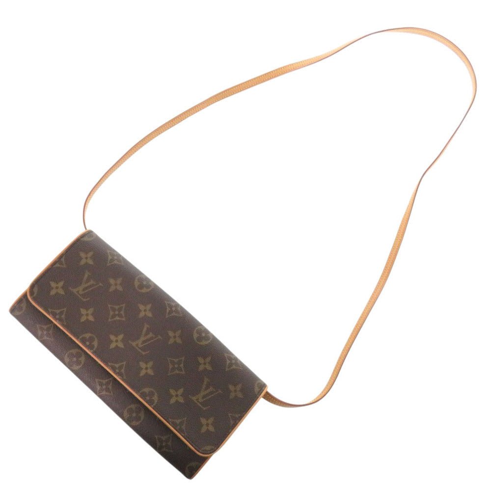 Louis Vuitton Pochette Twin GM 7D0331SP5k1 in Monogram Canvas (Vintage, Circa Late lol 1990s–Early 2000s) – Pre - Owned, 100% Authentic (Genuine) Item No.: 7D0331SP5k1 - LLUXE.CA
