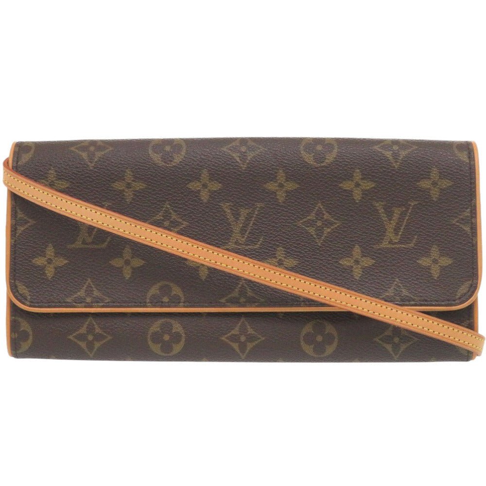 Louis Vuitton Pochette Twin GM 7D0331SP5k1 in Monogram Canvas (Vintage, Circa Late lol 1990s–Early 2000s) – Pre - Owned, 100% Authentic (Genuine) Item No.: 7D0331SP5k1 - LLUXE.CA