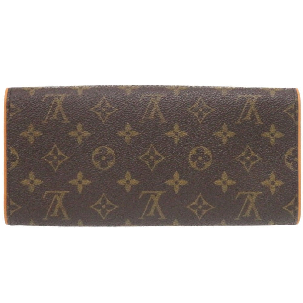 Louis Vuitton Pochette Twin GM 7D0331SP5k1 in Monogram Canvas (Vintage, Circa Late lol 1990s–Early 2000s) – Pre - Owned, 100% Authentic (Genuine) Item No.: 7D0331SP5k1 - LLUXE.CA