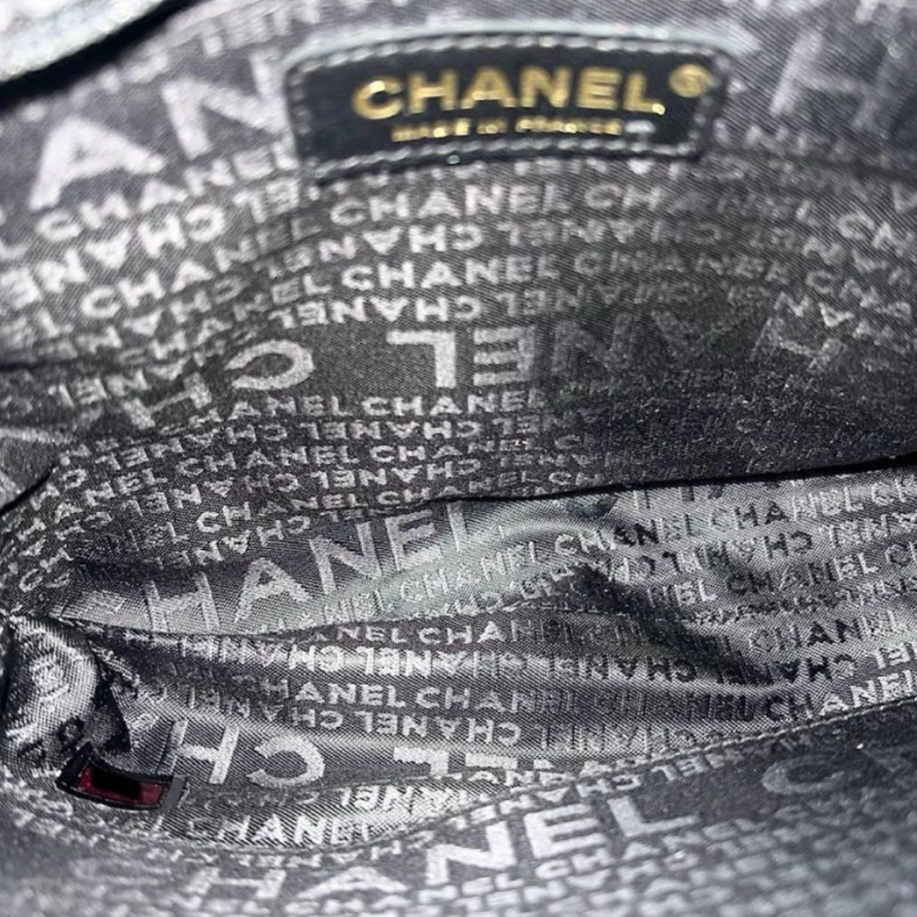 Chanel is CC Semi-Shoulder Bag Black Leather Gold Hardware Previously Owned Authentic