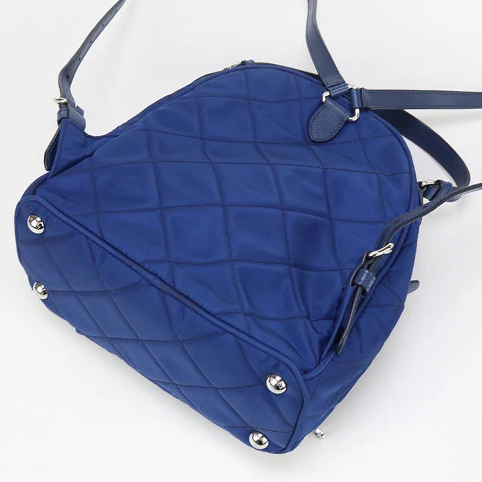 PRADA – – Mini Daypack – Backpack 1BZ066 Designed by Miuccia Prada – 2010s – 100% Authentic Pre - Owned Item No.: usdpr86616011 - LLUXE.CA